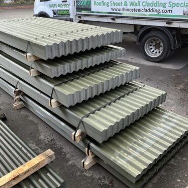 Cheap Packs of Olive Green PVC Plastisol Coated Scintilla Finish Corrugated 3” Profile Roofing Sheets. Packs of 6ft 6inch, 8ft, 10ft and 12ft lengths.